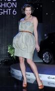 th_38422_Tikipeter_Milla_Jovovich_at_the_Lexus_Fashion_Night_in_Warsaw_021_123_251lo.jpg