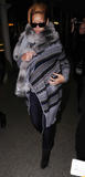 th_28266_Rihanna_at_Kings_Cross_Station_in_London_06_122_633lo.jpg